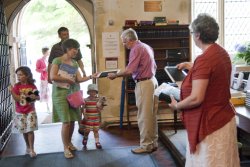 Photo of church members arriving at service