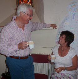 Photo of church members chatting over coffee